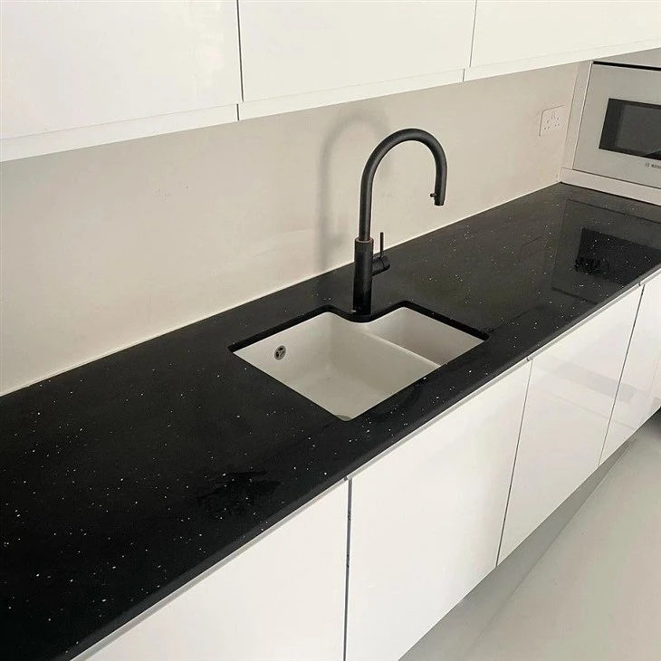 Black-Galaxy-Quartz-for-Countertops-Backsplashes-Accent-Walls-Shower-Surrounds.webp (1)